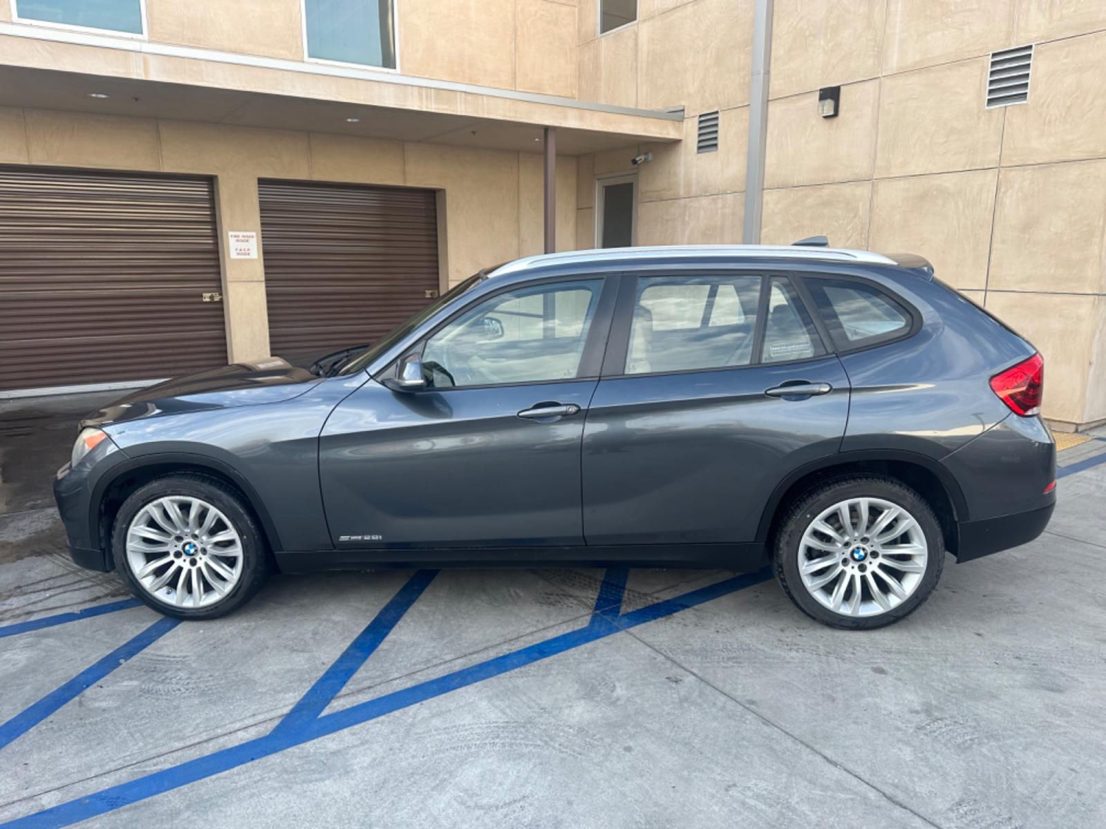 2014 Gray /black BMW X1 leather (WBAVM1C58EV) with an 4 CYLINDER engine, Automatic transmission, located at 30 S. Berkeley Avenue, Pasadena, CA, 91107, (626) 248-7567, 34.145447, -118.109398 - Photo #2